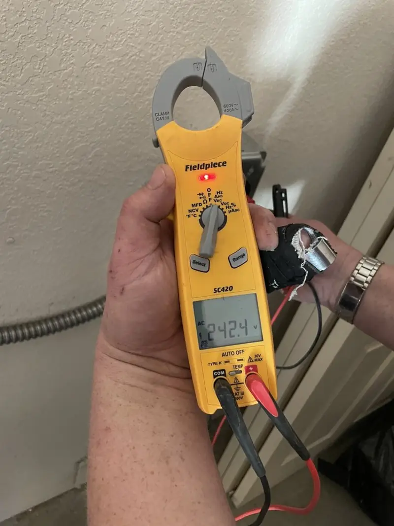 Voltage testing with clamp meter during Generator Installation in Frontenac